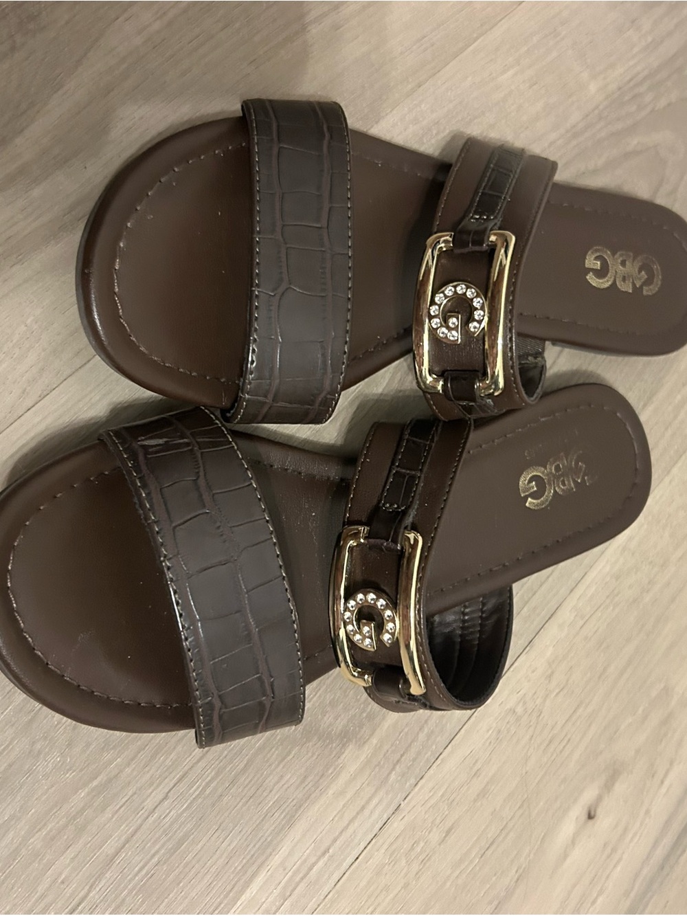 G by Guess Dark Brown Croc-Embossed Slide Sandals with Gold Accent